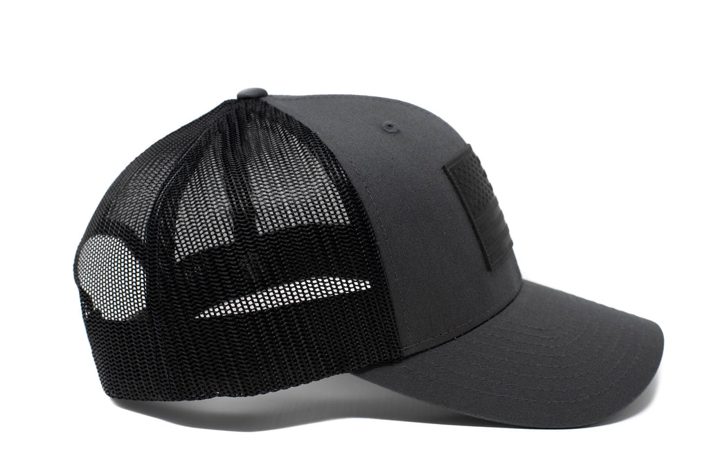 Charcoal trucker hat with black leather American flag patch