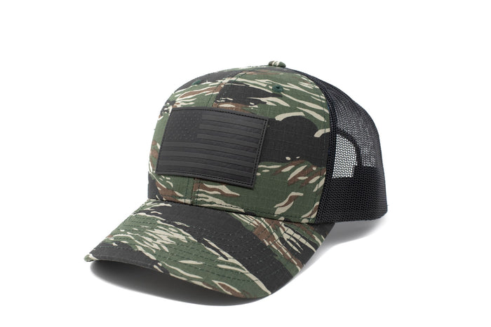Tiger stripe trucker hat with black leather American flag patch