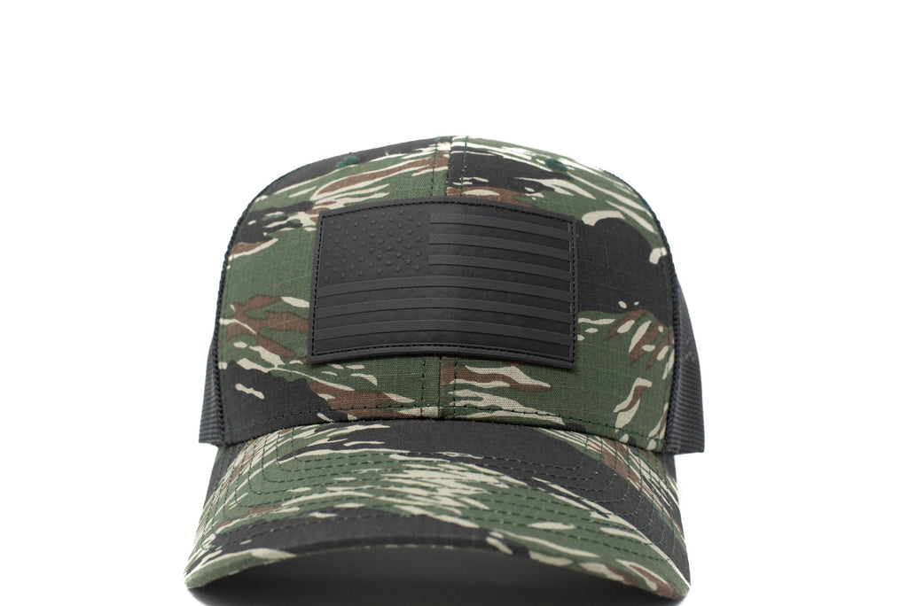 Tiger stripe trucker hat with black leather American flag patch
