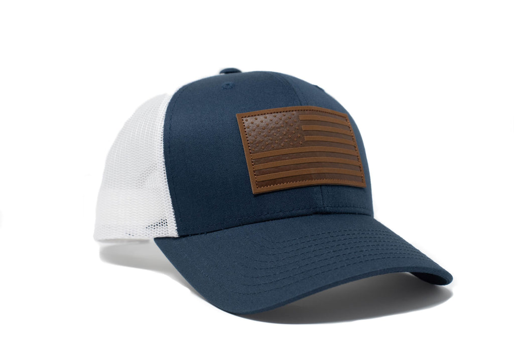 Navy trucker hat with brown leather American flag patch