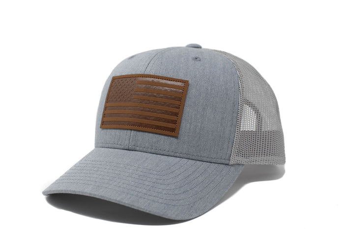 Grey trucker hat with brown leather American flag patch